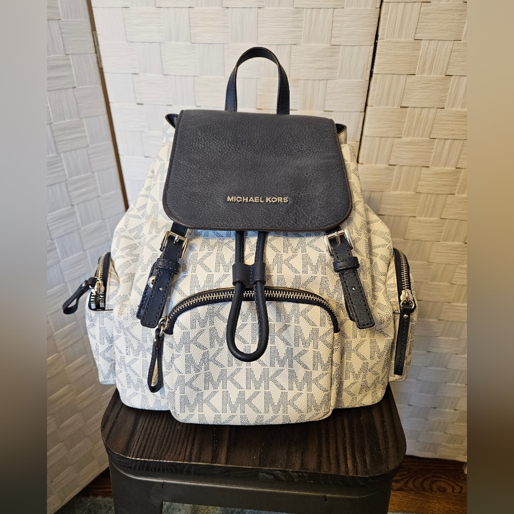 Michael Kors Abbey large logo cargo back pack with wallet and dust bag.